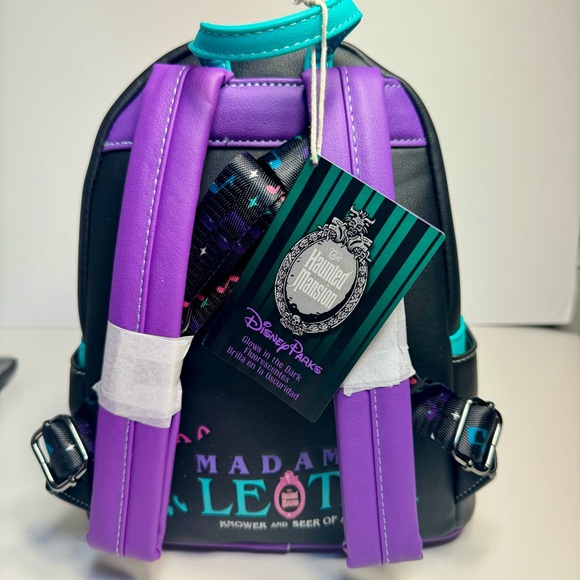 NWT. Loungefly Disney\'s The Haunted Mansion Madame Leota Mini Backpack glows main image 12